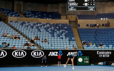 Spain's Garbine Muguruza serves to Britain's Johanna Konta during their second round match at the Australian Open tennis championships in Melbourne - Credit: AP