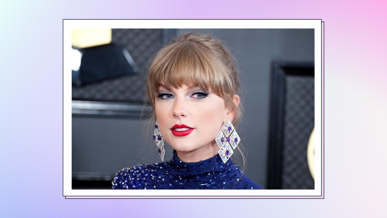  Taylor Swift wears a blue, sparkly dress and silver earrings as she  attends the 65th GRAMMY Awards on February 05, 2023 in Los Angeles, California./ in a purple and blue gradient template 