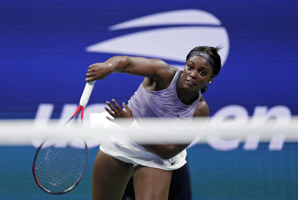Sloane Stephens, of the United States, serves to Anna Kalinskaya, of Russia, during the first round of the U.S. Open tennis tournament Tuesday, Aug. 27, 2019, in New York. (AP Photo/Adam Hunger)