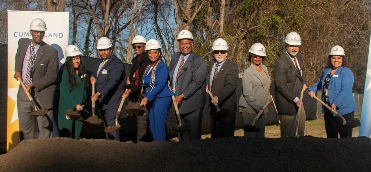 Cumberland County officials break ground Feb. 19, 2024, for a homeless support center on Hawley Street in Fayetteville. From left, are Cumberland County Manager Clarence Grier, Cumberland County Community Development Director Delores Taylor, County Engineering & Infrastructure Director Jermaine Walker, Social Services Director Brenda Reid Jackson, Commissioners' Vice Chair Toni Stewart, Chairman Glenn Adams, Commissioners Michael Boose, Jeannette Council and Jimmy Keefe and Assistant County Manager for Community Support Heather Skeens.