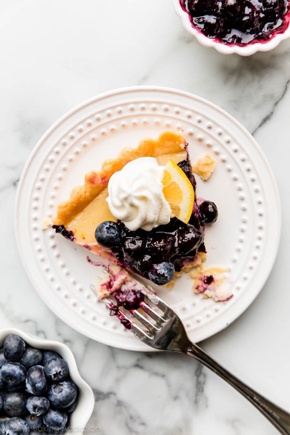 A slice of blueberry lemon tart.