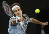 Tennis - Australian Open - Melbourne Park, Melbourne, Australia - 20/1/17 Switzerland's Roger Federer hits a shot during his Men's singles third round match against Czech Republic's Tomas Berdych. REUTERS/Thomas Peter