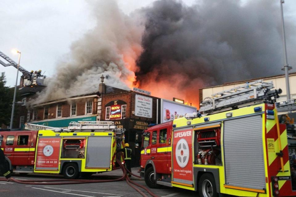 Huge flames could be seen coming from the roof of the building (Paul Wood)