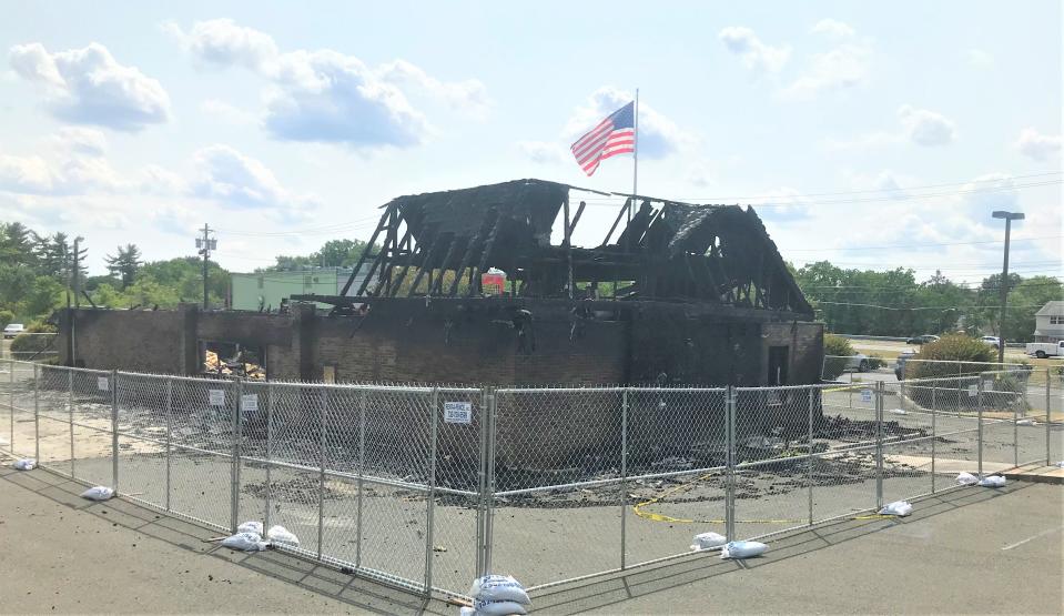 The former Nova Bank office at 30 Elm Avenue in Woodbury Heights was destroyed in a fire on Tuesday, June 6, 2023. Gloucester County is investigating the cause, but county officials are silent on details. Borough zoning officials on March 6 rejected an application from Shiv Prasad LLC of Allentown, Pa., to establish a retail cannabis store on the property. PHOTO: June 9, 2023.