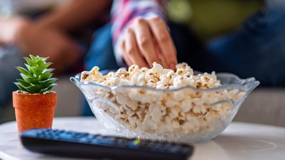 A bowl of popcorn on a table