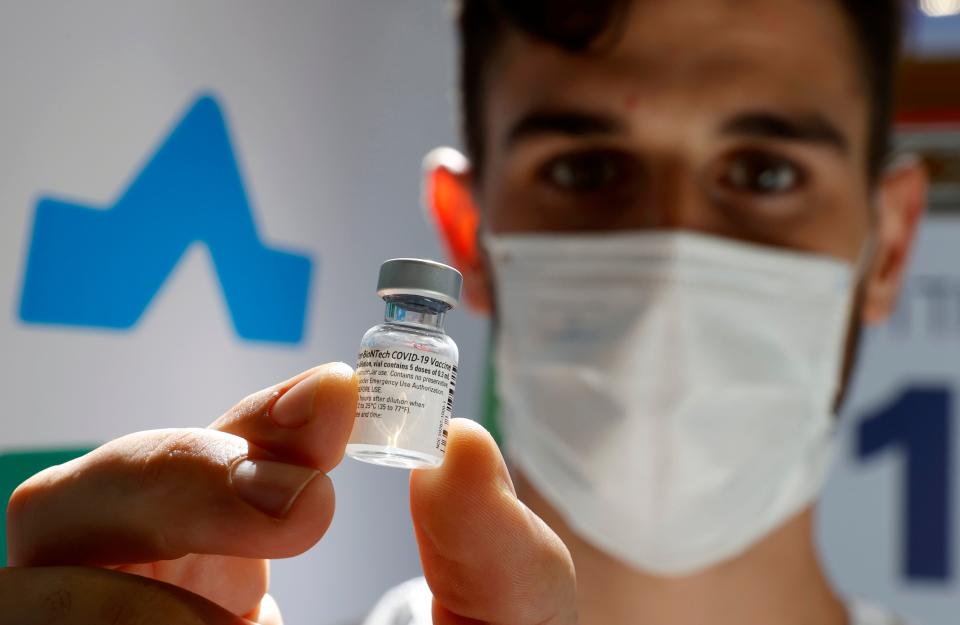 A health worker prepares a dose of the Pfizer-BioNtech COVID-19 vaccine at Clalit Health Services, in a gymnasium in the Israeli city of Petah Tikva, Israel on February 1, 2021. (Jack Guez/AFP via Getty Images)