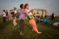 <p>Spiritual revellers celebrate the summer solstice (mid-summer and longest day) at the ancient stones of Stonehenge, on 21st June 2017, in Wiltshire, England. (Photo: Richard Baker/In Pictures via Getty Images) </p>