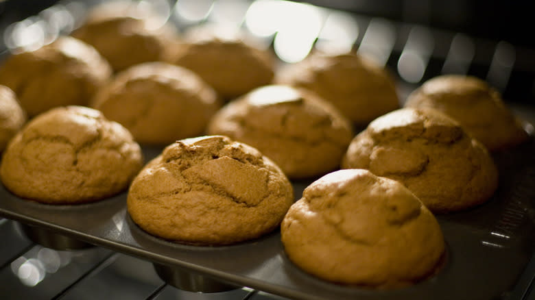 pumpkin muffins in tin