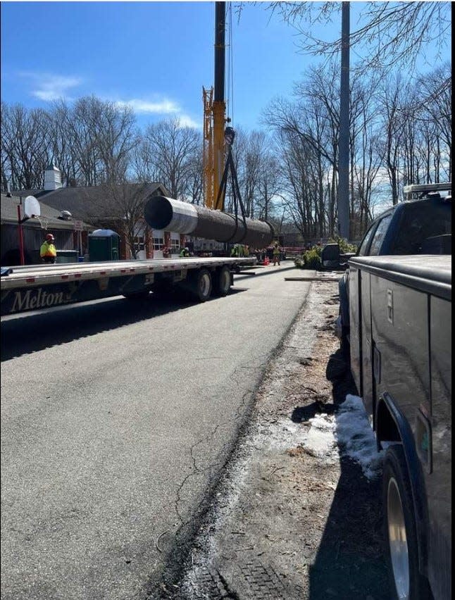 Monopole sections unloaded behind Fire Company 3 in Mahwah.