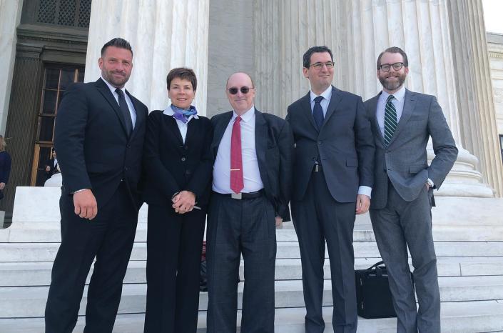 Brian Coughlin&#x002019;s legal team standing on the steps of the US Supreme Court on the morning of April 24, 2023. From left: Brian Coughlin, Terrie Harman, Richard Gottlieb, Gregory Rapawy, and Matthew Drecun (an associate from Rapawy&#x002019;s firm).