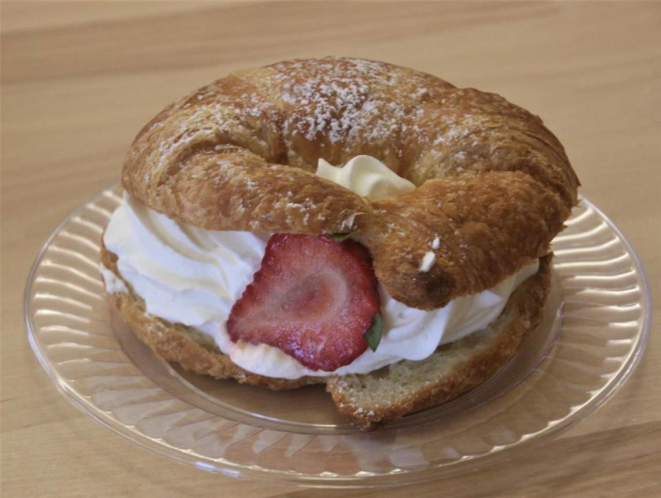 The stuffed croissant at Sugar Pop Baking Company in Waveland is filled with fresh fruit and whipped cream.