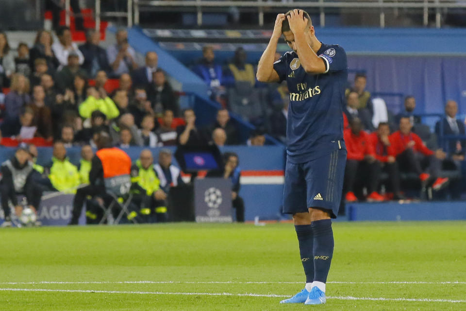 Real Madrid's Eden Hazard reacts after failing to score during the Champions League group A soccer match between PSG and Real Madrid at the Parc des Princes stadium in Paris, Wednesday, Sept. 18, 2019. (AP Photo/Michel Euler)