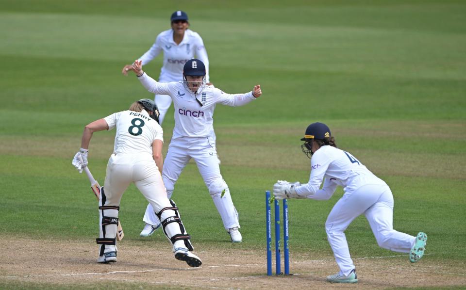 Australia batter Ellyse Perry survives a stumping chance by Amy Jones