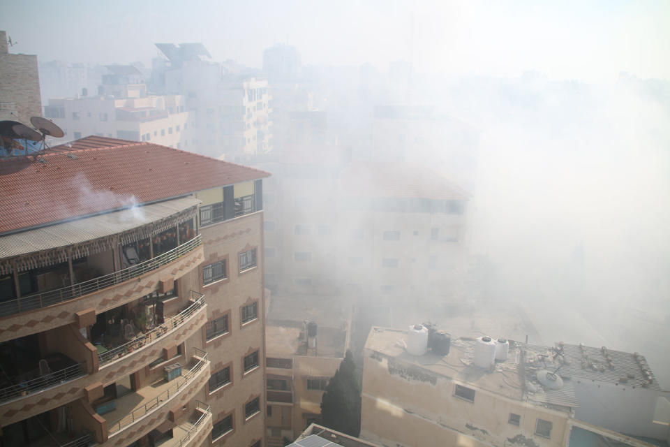 Smoke fills the air after Israeli aircraft bombed the area west of Gaza City on Oct. 11, 2023. (Ahmad Hasaballah / Getty Images)