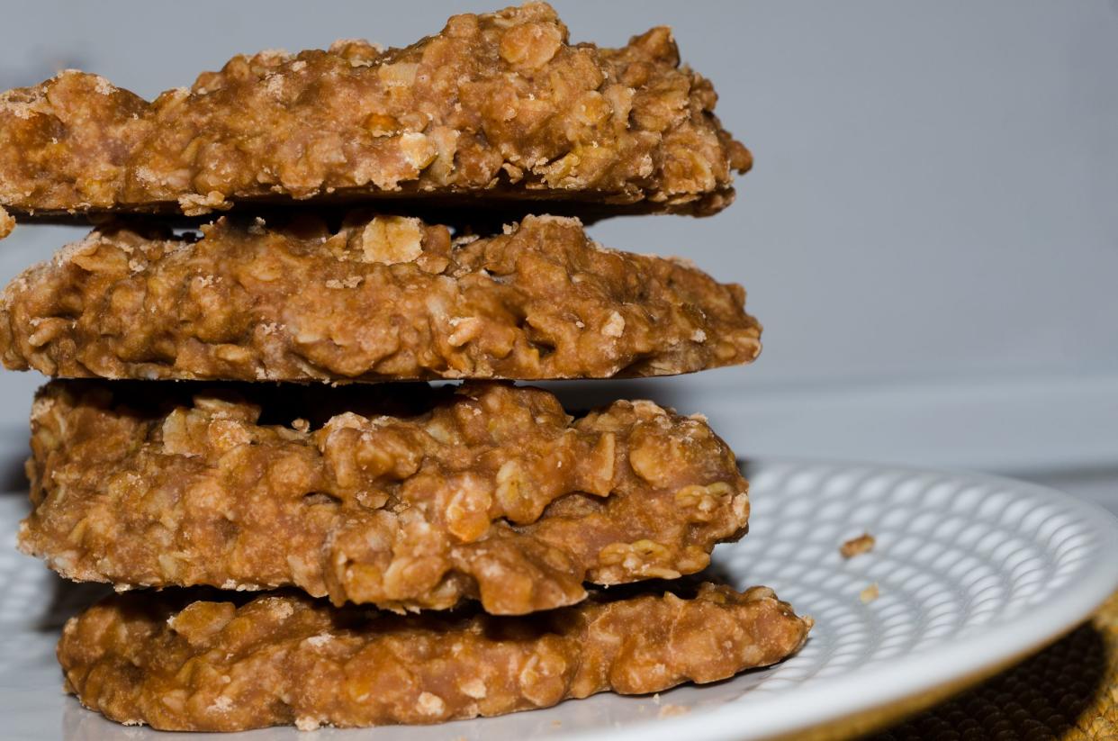 Fresh delicious chocolate, peanut butter and oatmeal no bake cookies. Homemade sweet treat dessert.