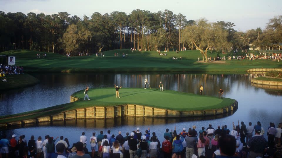 Davis Love III holes out during the 1993 Players Championship. - Gary Newkirk/Getty Images