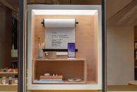 <p>Google Store Chelsea. A Discovery box in the store showcasing Google products like a smart display and Pixel phone.</p> 