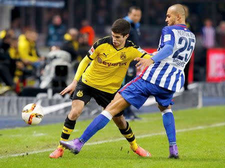 Football Soccer - Hertha Berlin v Borussia Dortmund - German Bundesliga - Olympiastadion, Berlin, Germany - 06/02/16 Borussia Dortmund's Christian Pulisic and Hertha Berlin's John Brooks in action