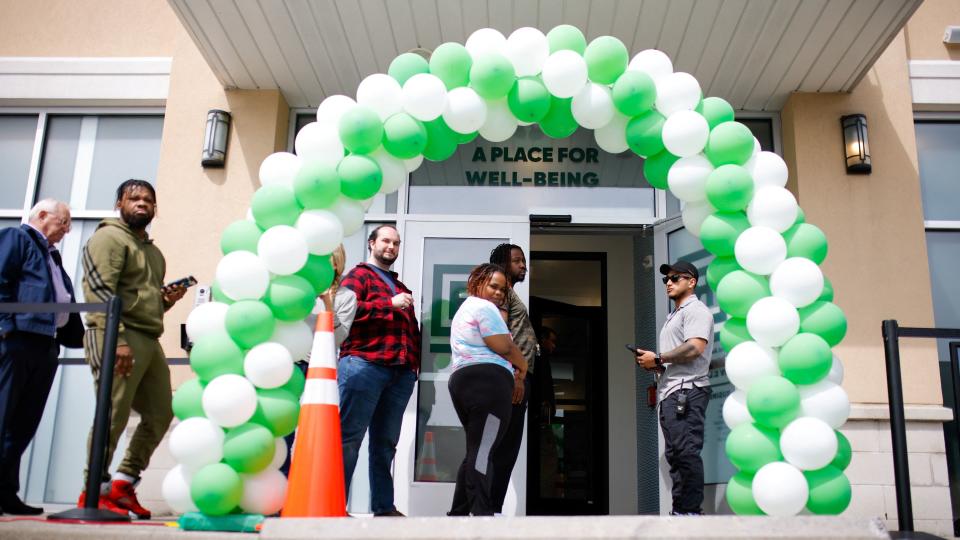 People line up to buy recreational marijuana at the RISE marijuana dispensary on the first day recreational sales are allowed for customers over the age of 21, in Paterson, New Jersey, U.S., April 21, 2022. REUTERS/Eduardo Munoz