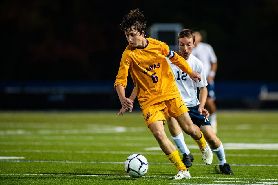 Rhinebeck's Felix Adams goes after the ball during the Section 9 class C boys soccer championship game in Middletown, NY on Tuesday, October 25, 2022. Rhinebeck defeated Mount Academy 1-0 in double overtime. KELLY MARSH/FOR THE TIMES HERALD-RECORD