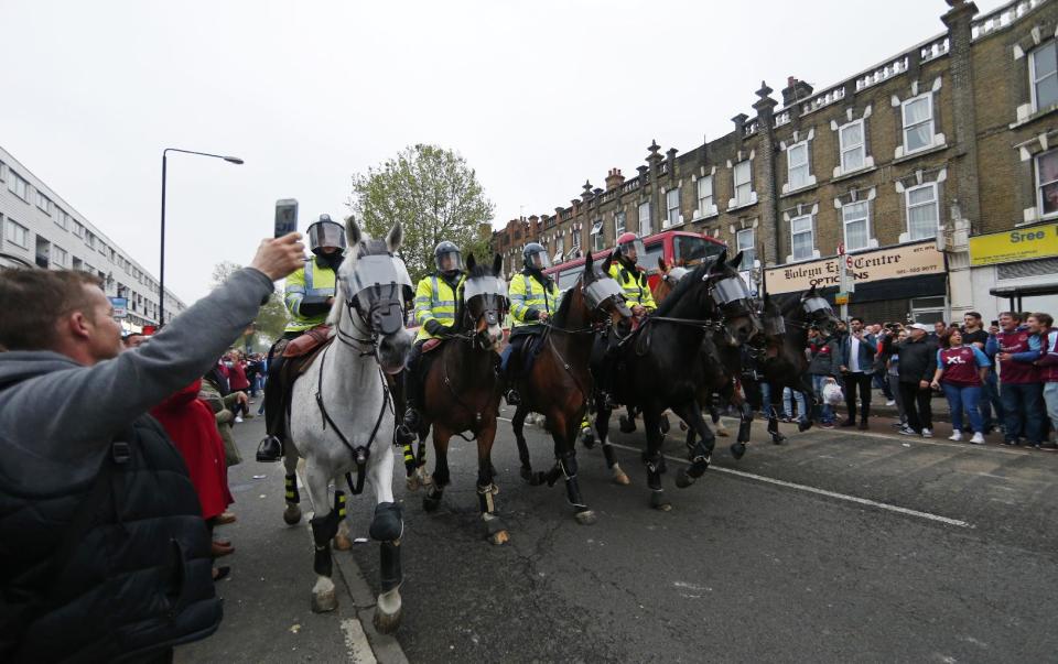 Britain Soccer Football - West Ham United v Manchester United - Barclays Premier League - Upton Park - 10/5/16 Police on horses outside the stadium before the match Reuters / Eddie Keogh Livepic EDITORIAL USE ONLY. No use with unauthorized audio, video, data, fixture lists, club/league logos or "live" services. Online in-match use limited to 45 images, no video emulation. No use in betting, games or single club/league/player publications. Please contact your account representative for further details.