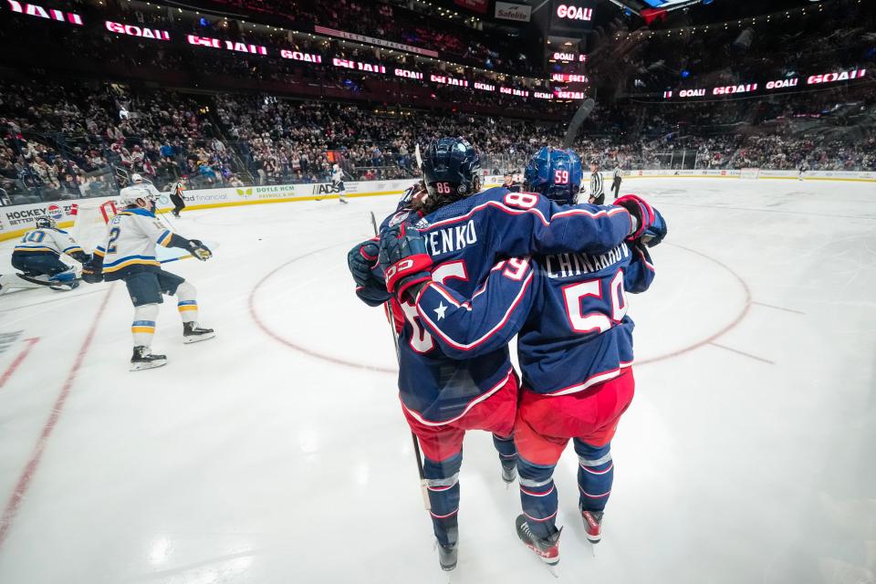 Dec 8, 2023; Columbus, Ohio, USA; Columbus Blue Jackets right wing Kirill Marchenko (86) celebrates a goal by right wing Yegor Chinakhov (59) during the third period of the NHL game against the St. Louis Blues at Nationwide Arena. The Blue Jackets won 5-2.