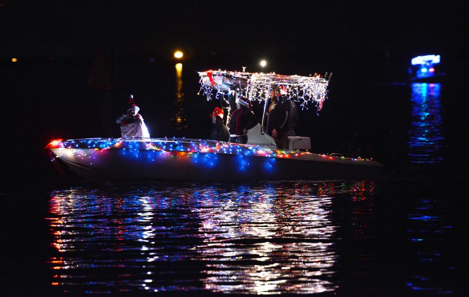 Boats wearing festive decorations will light up the water around Merritt Island during the annual Merritt Island Boat Parade on Dec. 16.