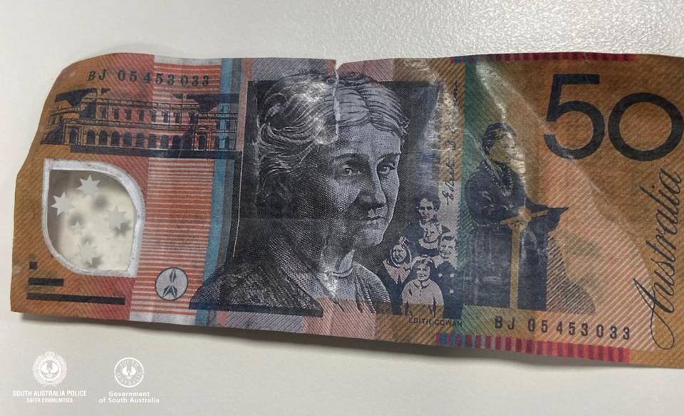 A tear can be seen in the fake $50 note used at the Royal Adelaide Show. 