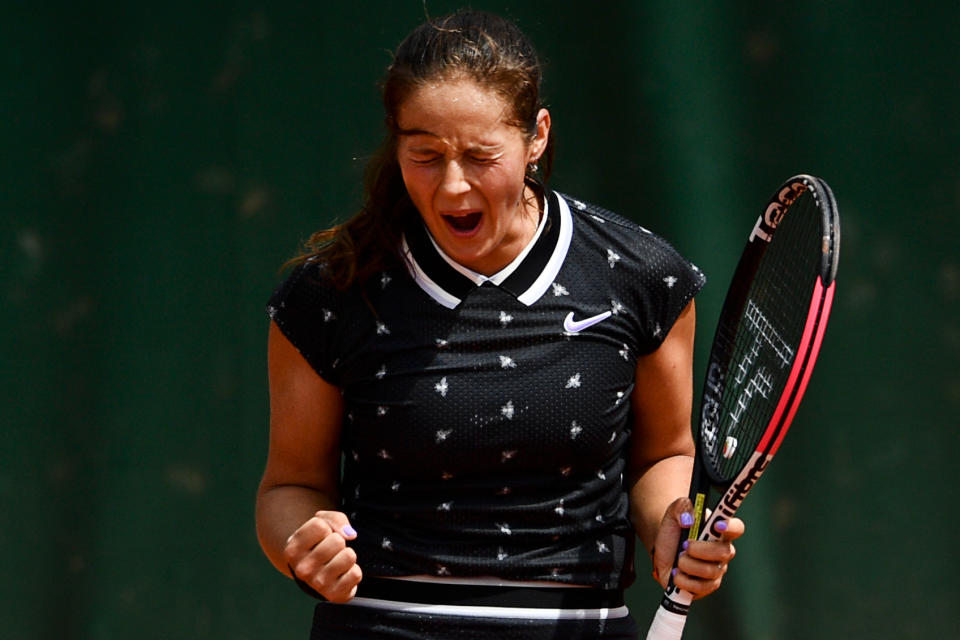 Russia's Daria Kasatkina celebrates after winning against Italy's Jasmine Paoli in their women's singles first round match on day three of The Roland Garros 2019 French Open tennis tournament in Paris on May 28, 2019. (Photo by Martin Bureau/AFP/Getty Images)