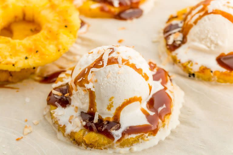 <p>Pineapple adds such great sweetness to this dessert.</p><p>Get the <a href="https://www.delish.com/uk/cooking/recipes/a28796716/grilled-pineapple-sundaes-recipes/" rel="nofollow noopener" target="_blank" data-ylk="slk:Grilled Pineapple Sundaes;elm:context_link;itc:0;sec:content-canvas" class="link ">Grilled Pineapple Sundaes</a> recipe. </p>