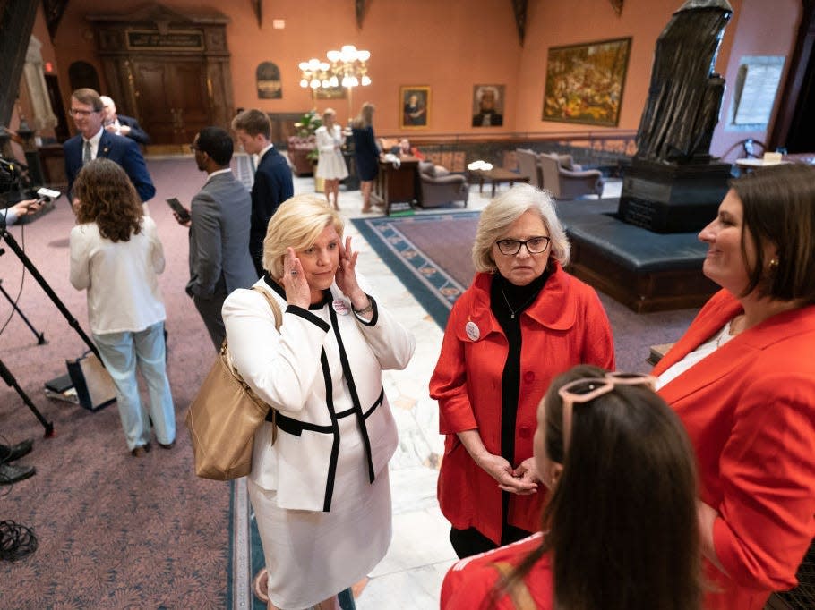 Republican state Sens. Penry Gustafson (L) and Katrina Shealy (C) at the Statehouse on May 23, 2023 in Columbia, South Carolina. A bi-partisan group of five women led a filibuster that failed to block the legislation.