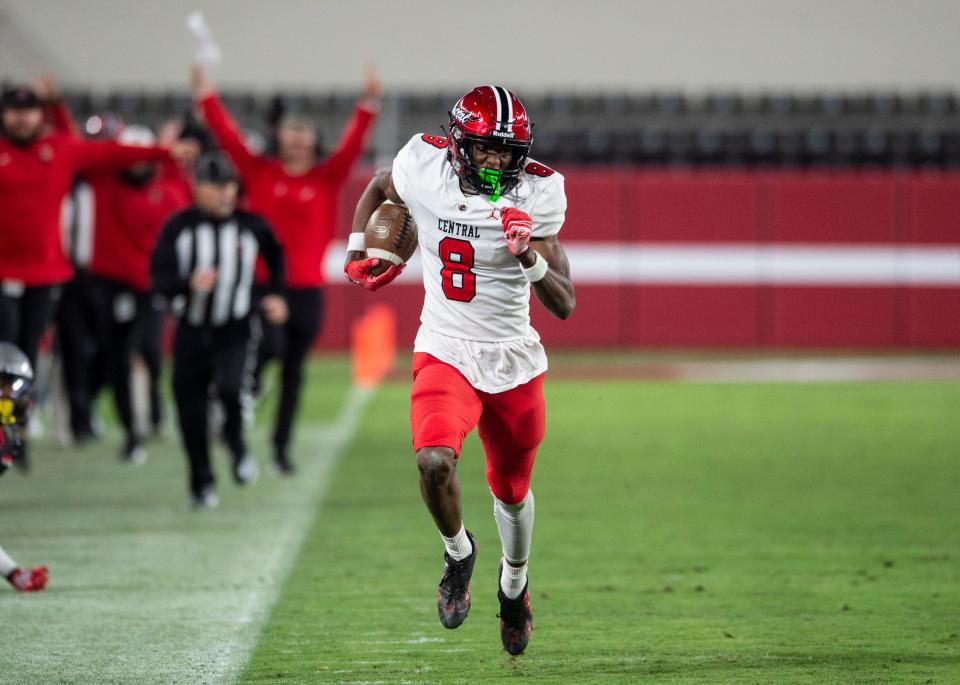 Central Phenix City's Cameron Coleman (8) breaks free for a touchdown after a catch as Central Phenix City faces Thompson in the Class 7A football state championship at Bryant-Denny Stadium in Tuscaloosa, Ala., on Wednesday, Dec. 6, 2023. Central Phenix City defeated Thompson 21-19.