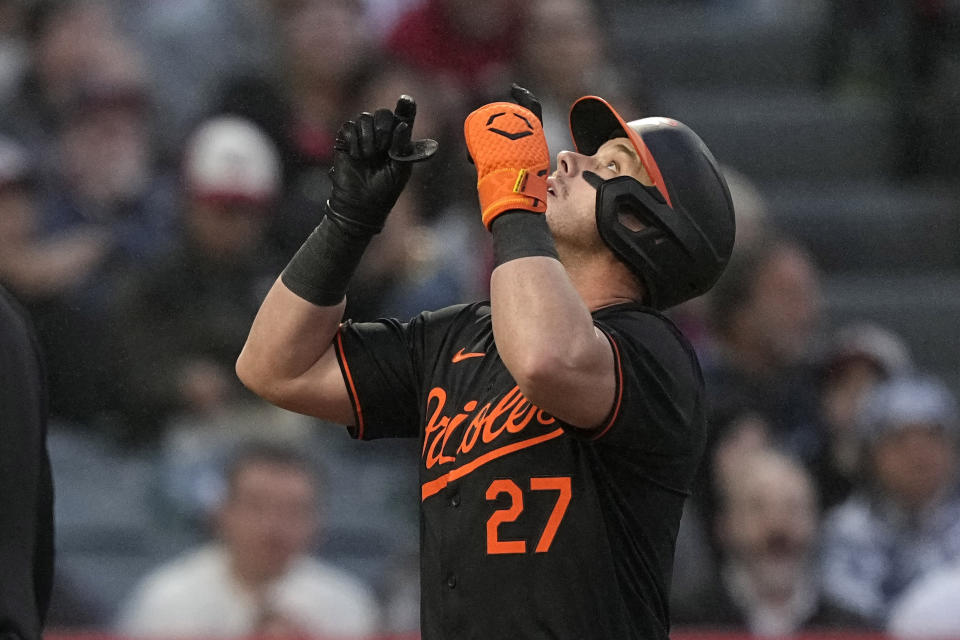 Baltimore Orioles' James McCann gestures as he scores after hitting a solo home run during the second inning of a baseball game against the Los Angeles Angels Monday, April 22, 2024, in Anaheim, Calif. (AP Photo/Mark J. Terrill)