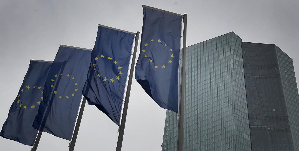 Flags of the European Union flutter in front of the headquarters of the European Central Bank (ECB) in Frankfurt am Main, western Germany, on March 12, 2020. - The ECB's governing council left its key interest rates unchanged but unveiled fresh stimulus to keep liquidity flowing in the face of the worsening coronavirus crisis, joining efforts by central banks around the world. (Photo by Daniel ROLAND / AFP) (Photo by DANIEL ROLAND/AFP via Getty Images)