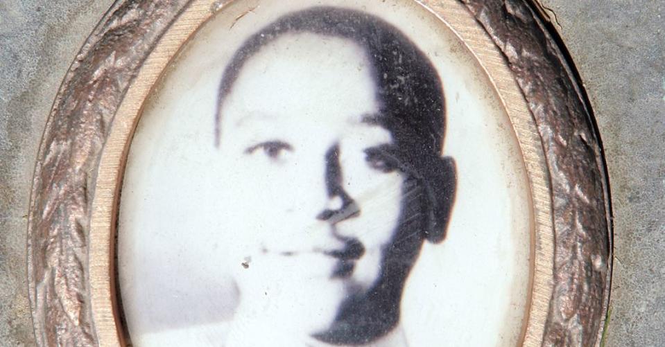 A photo of Emmett Till is included on the plaque that marks his gravesite at Burr Oak Cemetery in Aslip, Illinois. May 4, 2005  / Credit: Scott Olson/Getty Images  