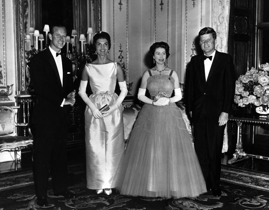 In this picture from 1961, Queen Elizabeth and Prince Philip host a Queen's Dinner for President John F Kennedy and Jackie Kennedy at Buckingham Palace. (Wikipedia)