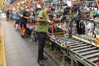 FILE PHOTO: Engines assembled as they make their way through the assembly line at the General Motors (GM) manufacturing plant in Spring Hill