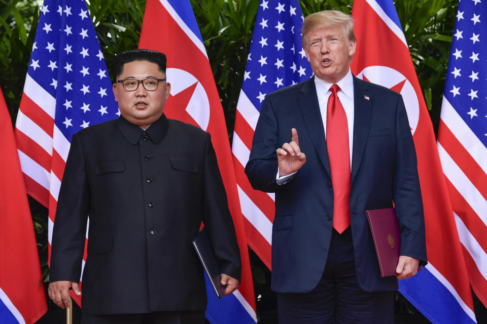 <p>President Donald Trump makes a statement before saying goodbye to North Korea leader Kim Jong Un after their meetings at the Capella resort on Sentosa Island Tuesday, June 12, 2018 in Singapore. (Photo: Susan Walsh, Pool/AP) </p>