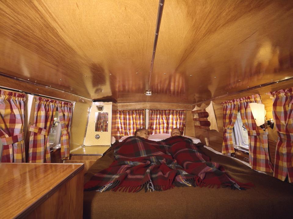 The interior of a 1962 Ford Econoline camper van.