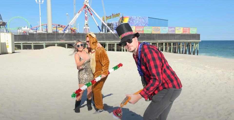 Brooke Christian as Snooki, Jeff Erdman and Tommy Byrne in the video for Byrne's song, "Coal for Christmas," filmed by Gig USA.