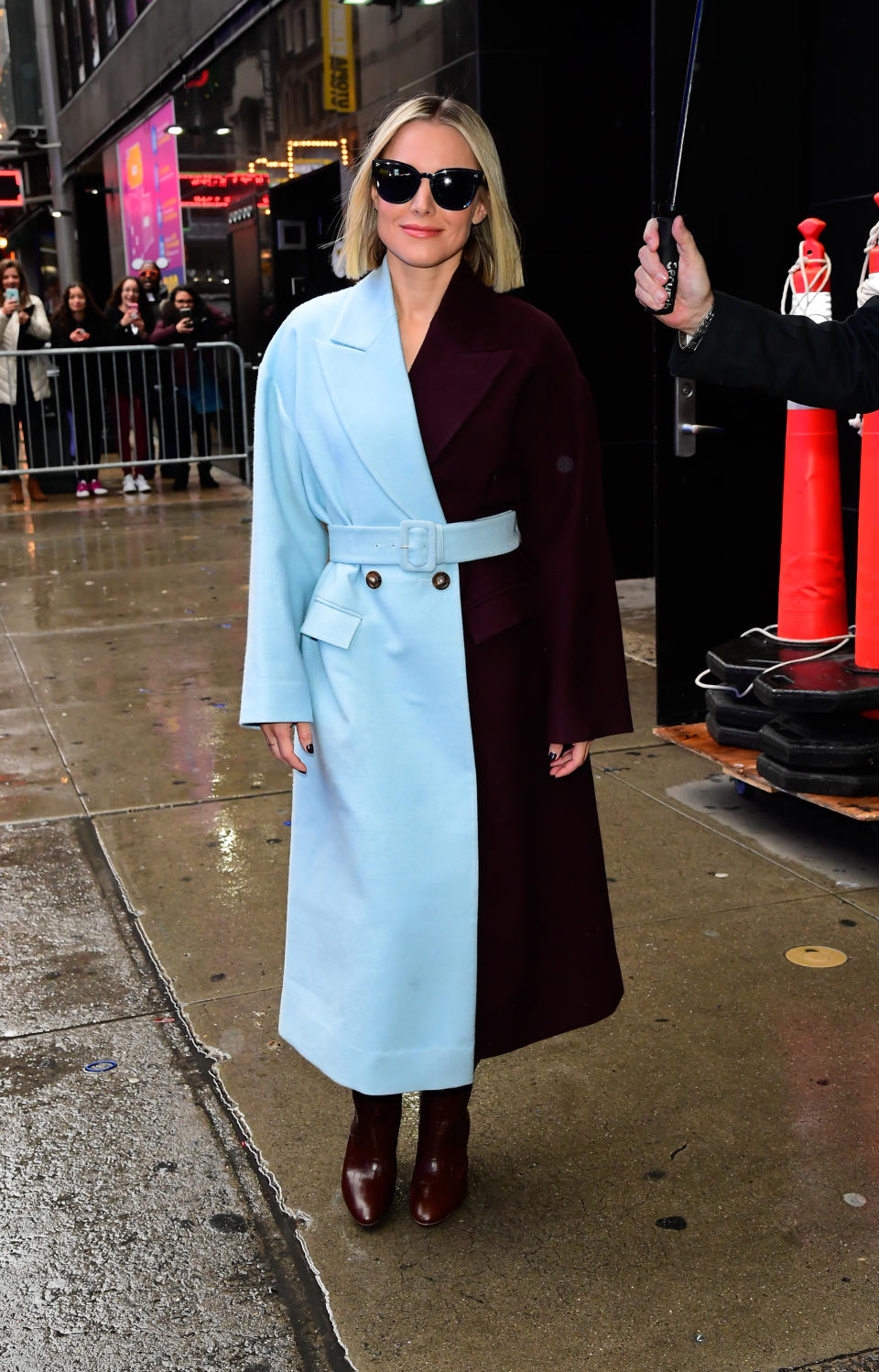 Kristen Bell wears a Bouguessa coat. (Credit: Getty Images)