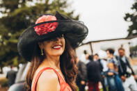 <p>Under the Monterey sun, it's an arms race between headwear. And the biggest, floppiest, most impressive hat may as well be a crown. </p>