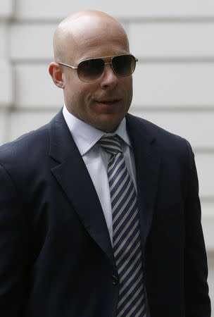 Former Barclay's trader Ryan Reich arrives at Westminster Magistrates Court in London May 27, 2014. REUTERS/Luke MacGregor