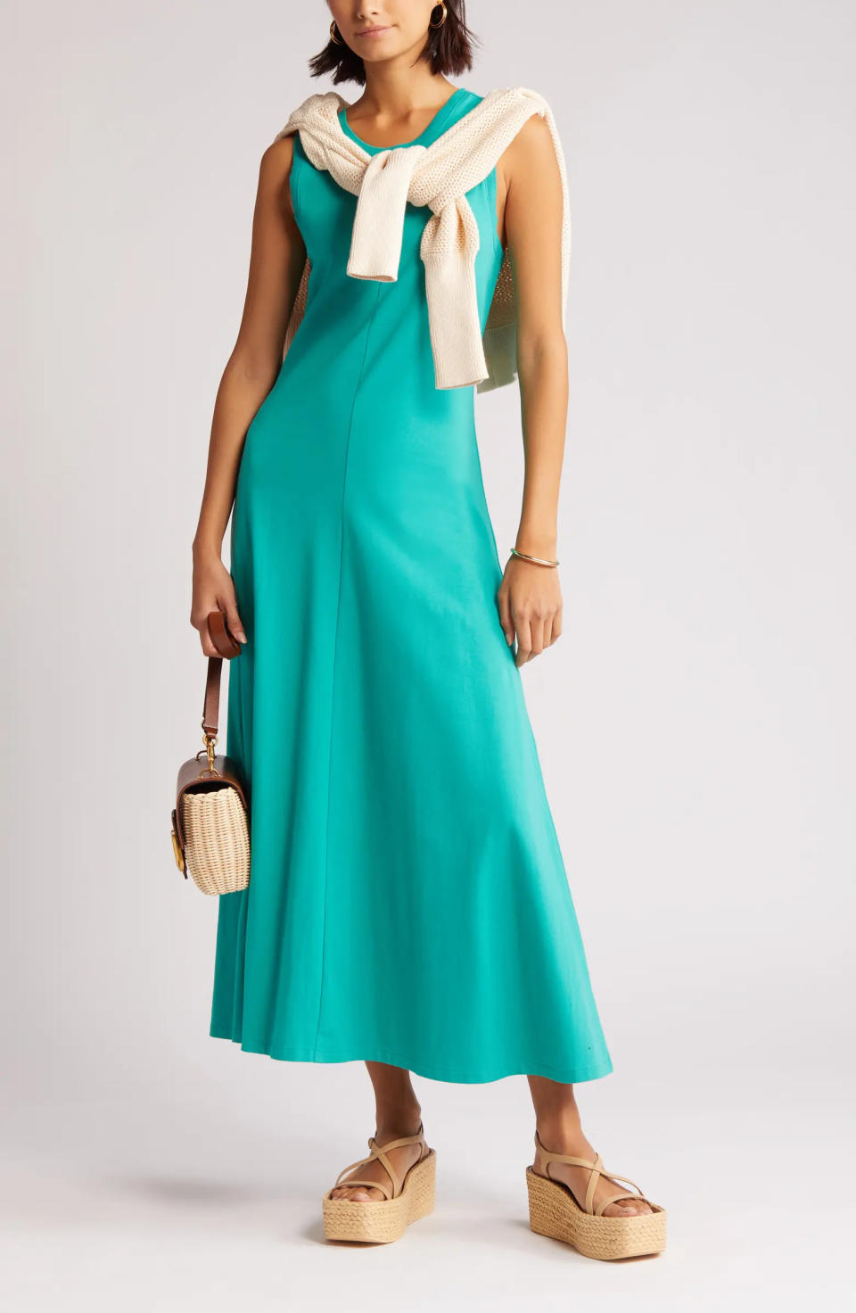 This tank dress comes in numerous cheery colours, including this aqua hue. 