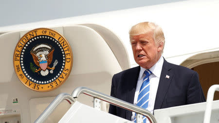 U.S. President Donald Trump steps from Air Force One, en route to nearby Camp David to meet with the National Security Council to try to agree on a strategy for Afghanistan, in Hagerstown, Maryland, U.S., August 18, 2017. REUTERS/Kevin Lamarque