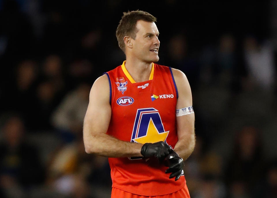 Luke Darcy of the All Stars puts on his gloves during the 2017 EJ Whitten Legends Game between Victoria and the All Stars at Etihad Stadium on September 1, 2017 in Melbourne, Australia. The match is held to celebrate the life of the legendary Ted Whitten and raise awareness for prostate cancer.