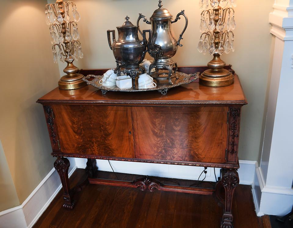 Many of the inn's furniture pieces have a story around them. For instance, this sideboard was found outside the Governor's Mansion by Mack Abernathy as a college student.