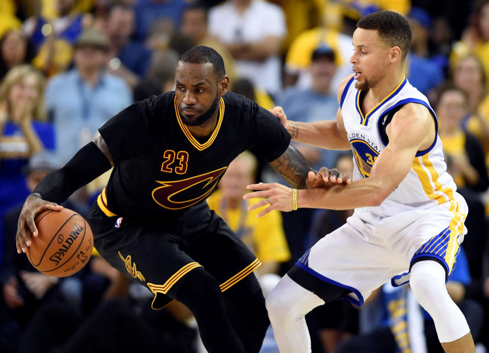 Jun 19, 2016; Oakland, CA, USA; Cleveland Cavaliers forward LeBron James (23) handles the ball against Golden State Warriors guard Stephen Curry (30) during the third quarter in game seven of the NBA Finals at Oracle Arena. Mandatory Credit: Bob Donnan-USA TODAY Sports TPX IMAGES OF THE DAY