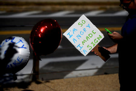 Logan Kennedy, 19, a West Chester University sophomore, student demonstrates with university employees from the union representing 5,500 Pennsylvania university and college employees after failing to reach a contract deal with the state education system in West Chester, Pennsylvania, U.S., October 19, 2016. REUTERS/Mark Makela