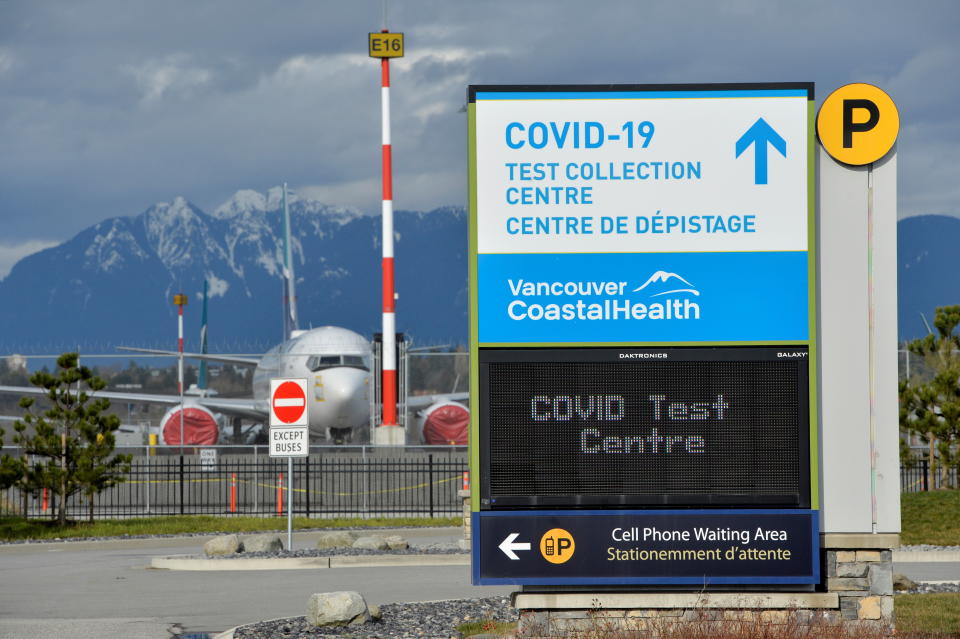 A sign for the coronavirus disease (COVID-19) test collection centre is seen at Vancouver International Airport in Richmond, British Columbia, Canada February 22, 2021. REUTERS/Jennifer Gauthier